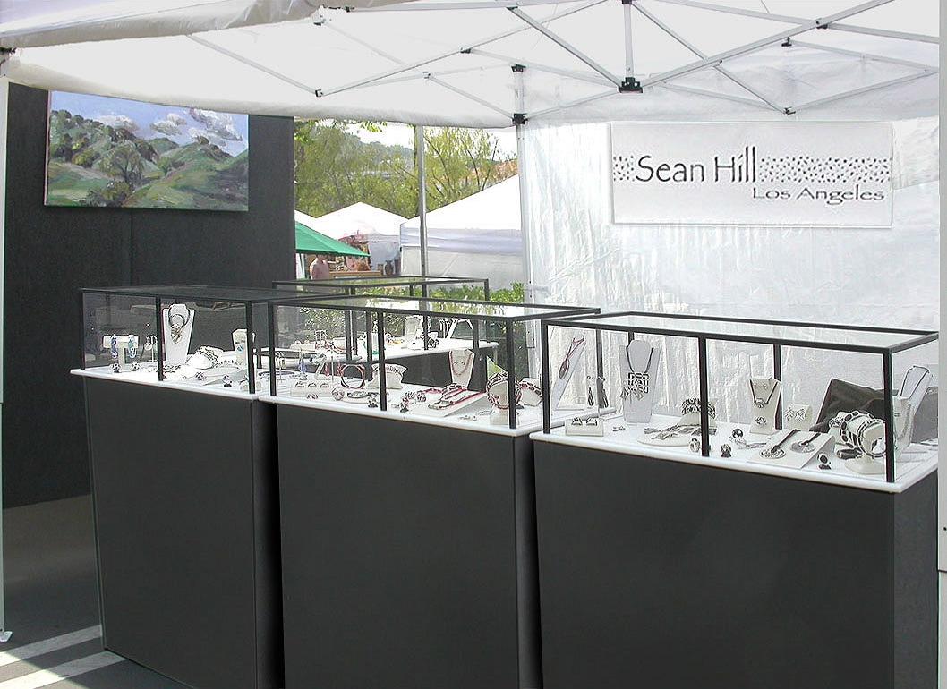 Booth 9 — DDS portable trade show display at an art fair